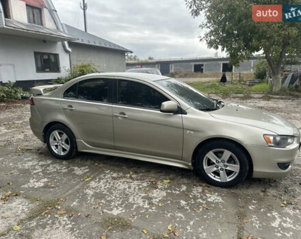 Бежевий Міцубісі Lancer, об'ємом двигуна 2 л та пробігом 312 тис. км за 4700 $, фото 2 на Automoto.ua