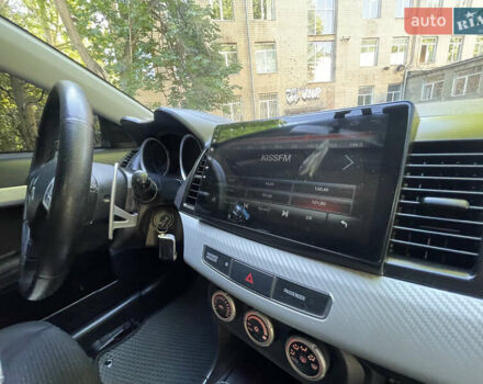 Бежевий Міцубісі Lancer, об'ємом двигуна 2 л та пробігом 189 тис. км за 6500 $, фото 20 на Automoto.ua