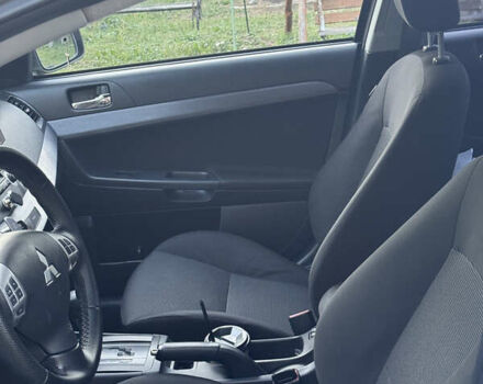 Бежевый Мицубиси Лансер, объемом двигателя 2 л и пробегом 240 тыс. км за 6500 $, фото 13 на Automoto.ua