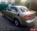 Бежевий Міцубісі Lancer, об'ємом двигуна 2 л та пробігом 209 тис. км за 7400 $, фото 5 на Automoto.ua