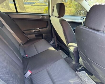 Бежевий Міцубісі Lancer, об'ємом двигуна 1.5 л та пробігом 217 тис. км за 5690 $, фото 16 на Automoto.ua