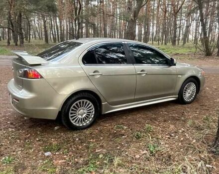 Бежевий Міцубісі Lancer, об'ємом двигуна 2 л та пробігом 262 тис. км за 6500 $, фото 5 на Automoto.ua