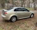 Бежевий Міцубісі Lancer, об'ємом двигуна 2 л та пробігом 262 тис. км за 6500 $, фото 5 на Automoto.ua