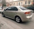 Бежевий Міцубісі Lancer, об'ємом двигуна 2 л та пробігом 190 тис. км за 7700 $, фото 1 на Automoto.ua