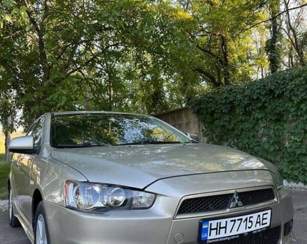 Бежевый Мицубиси Лансер, объемом двигателя 2 л и пробегом 146 тыс. км за 7750 $, фото 6 на Automoto.ua