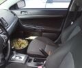 Бежевый Мицубиси Лансер, объемом двигателя 2 л и пробегом 235 тыс. км за 7200 $, фото 4 на Automoto.ua