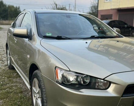 Бежевый Мицубиси Лансер, объемом двигателя 2 л и пробегом 240 тыс. км за 6500 $, фото 1 на Automoto.ua