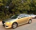 Бежевий Міцубісі Lancer, об'ємом двигуна 2 л та пробігом 68 тис. км за 8300 $, фото 1 на Automoto.ua