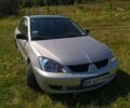 Бежевий Міцубісі Lancer, об'ємом двигуна 1.6 л та пробігом 200 тис. км за 3700 $, фото 1 на Automoto.ua