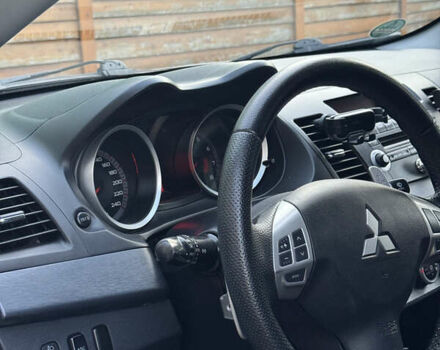 Бежевый Мицубиси Лансер, объемом двигателя 2 л и пробегом 240 тыс. км за 6500 $, фото 11 на Automoto.ua