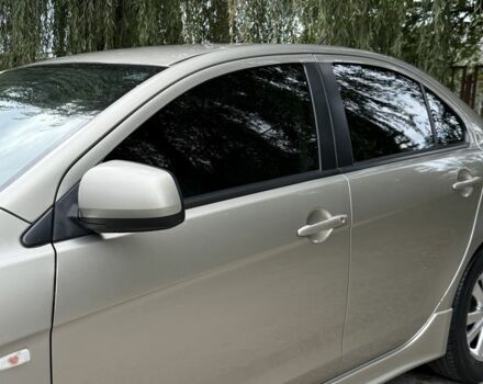 Бежевий Міцубісі Lancer, об'ємом двигуна 2 л та пробігом 280 тис. км за 6600 $, фото 2 на Automoto.ua