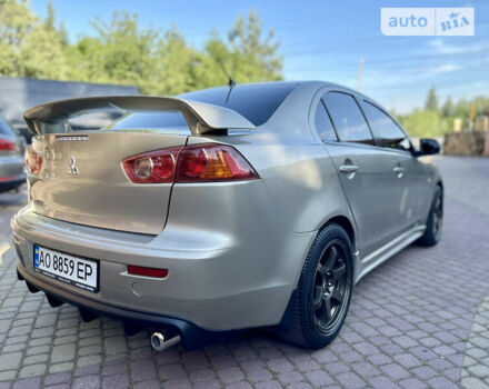 Бежевий Міцубісі Lancer, об'ємом двигуна 2 л та пробігом 222 тис. км за 6750 $, фото 33 на Automoto.ua