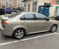 Бежевий Міцубісі Lancer, об'ємом двигуна 2 л та пробігом 173 тис. км за 7500 $, фото 6 на Automoto.ua