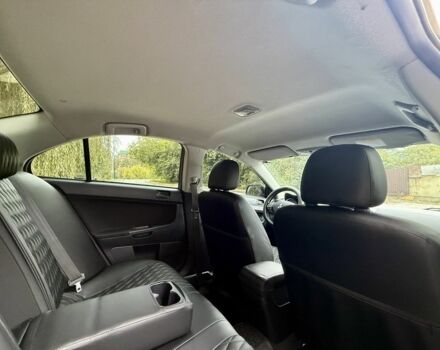 Бежевий Міцубісі Lancer, об'ємом двигуна 2 л та пробігом 280 тис. км за 6600 $, фото 18 на Automoto.ua