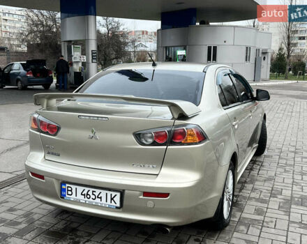 Бежевий Міцубісі Lancer, об'ємом двигуна 2 л та пробігом 262 тис. км за 6000 $, фото 8 на Automoto.ua