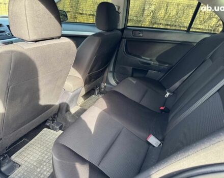 Бежевий Міцубісі Lancer, об'ємом двигуна 1.5 л та пробігом 217 тис. км за 5690 $, фото 13 на Automoto.ua