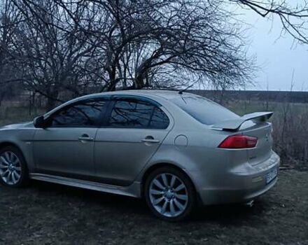 Бежевий Міцубісі Lancer, об'ємом двигуна 2 л та пробігом 260 тис. км за 7500 $, фото 1 на Automoto.ua