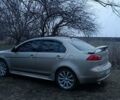 Бежевий Міцубісі Lancer, об'ємом двигуна 2 л та пробігом 260 тис. км за 7500 $, фото 1 на Automoto.ua