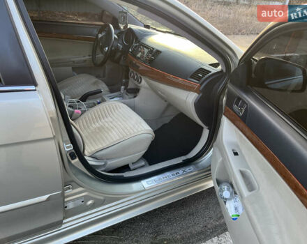 Бежевый Мицубиси Лансер, объемом двигателя 1.5 л и пробегом 200 тыс. км за 8500 $, фото 6 на Automoto.ua