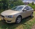 Бежевий Міцубісі Lancer, об'ємом двигуна 1.5 л та пробігом 287 тис. км за 6500 $, фото 1 на Automoto.ua