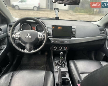 Бежевий Міцубісі Lancer, об'ємом двигуна 2 л та пробігом 312 тис. км за 4700 $, фото 13 на Automoto.ua