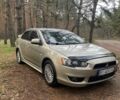 Бежевий Міцубісі Lancer, об'ємом двигуна 2 л та пробігом 262 тис. км за 6500 $, фото 1 на Automoto.ua