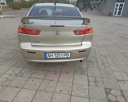 Бежевий Міцубісі Lancer, об'ємом двигуна 2 л та пробігом 340 тис. км за 5700 $, фото 2 на Automoto.ua