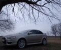 Бежевий Міцубісі Lancer, об'ємом двигуна 2 л та пробігом 260 тис. км за 7500 $, фото 1 на Automoto.ua