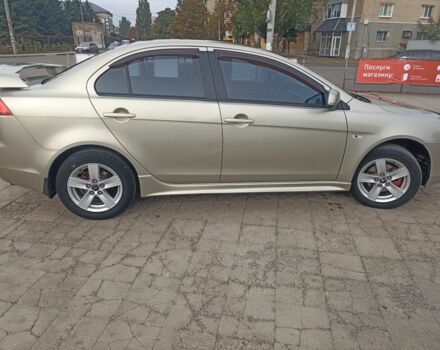 Бежевий Міцубісі Lancer, об'ємом двигуна 2 л та пробігом 340 тис. км за 5700 $, фото 1 на Automoto.ua