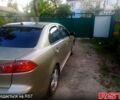Бежевий Міцубісі Lancer, об'ємом двигуна 2 л та пробігом 209 тис. км за 7400 $, фото 10 на Automoto.ua