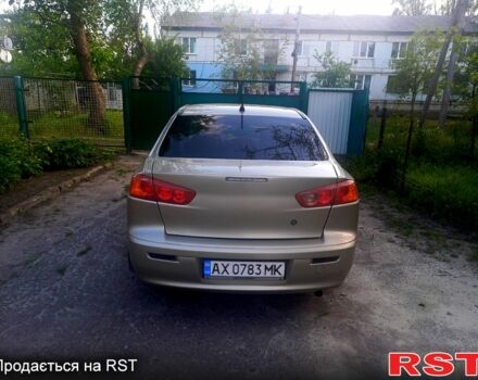 Бежевий Міцубісі Lancer, об'ємом двигуна 2 л та пробігом 209 тис. км за 7400 $, фото 11 на Automoto.ua