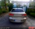 Бежевий Міцубісі Lancer, об'ємом двигуна 2 л та пробігом 209 тис. км за 7400 $, фото 11 на Automoto.ua
