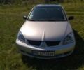Бежевий Міцубісі Lancer, об'ємом двигуна 1.6 л та пробігом 200 тис. км за 3700 $, фото 2 на Automoto.ua