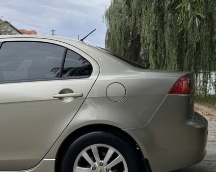 Бежевий Міцубісі Lancer, об'ємом двигуна 2 л та пробігом 280 тис. км за 6600 $, фото 1 на Automoto.ua