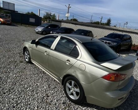 Бежевий Міцубісі Lancer, об'ємом двигуна 2 л та пробігом 253 тис. км за 5500 $, фото 5 на Automoto.ua