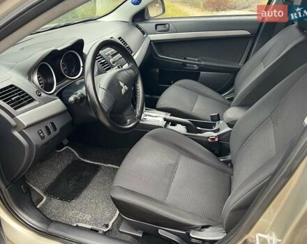 Бежевый Мицубиси Лансер, объемом двигателя 1.5 л и пробегом 230 тыс. км за 5950 $, фото 6 на Automoto.ua