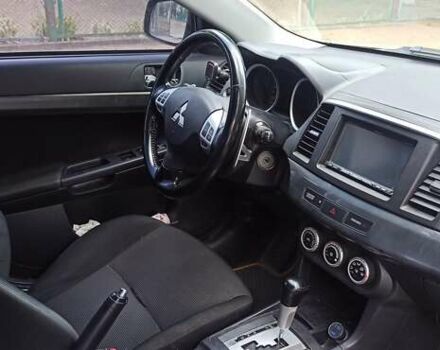 Бежевый Мицубиси Лансер, объемом двигателя 2 л и пробегом 235 тыс. км за 7200 $, фото 11 на Automoto.ua