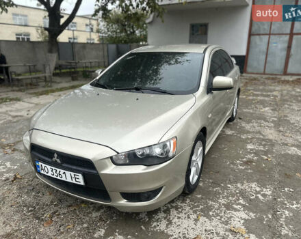 Бежевий Міцубісі Lancer, об'ємом двигуна 2 л та пробігом 312 тис. км за 4700 $, фото 1 на Automoto.ua