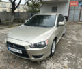 Бежевий Міцубісі Lancer, об'ємом двигуна 2 л та пробігом 312 тис. км за 4700 $, фото 1 на Automoto.ua