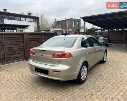 Бежевый Мицубиси Лансер, объемом двигателя 1.5 л и пробегом 230 тыс. км за 5950 $, фото 4 на Automoto.ua