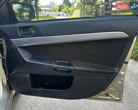 Бежевый Мицубиси Лансер, объемом двигателя 1.5 л и пробегом 192 тыс. км за 6690 $, фото 20 на Automoto.ua