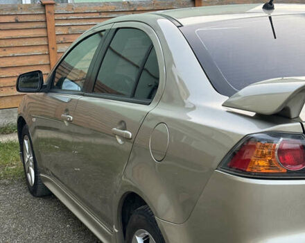 Бежевый Мицубиси Лансер, объемом двигателя 2 л и пробегом 240 тыс. км за 6500 $, фото 5 на Automoto.ua