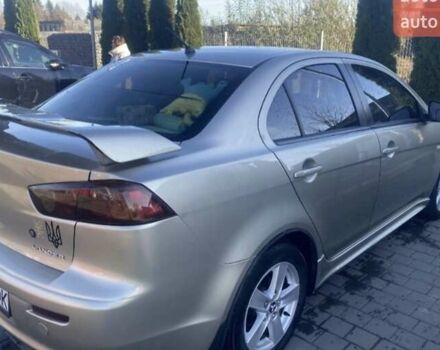 Бежевый Мицубиси Лансер, объемом двигателя 2 л и пробегом 220 тыс. км за 7300 $, фото 5 на Automoto.ua