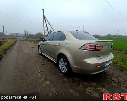 Бежевый Мицубиси Лансер, объемом двигателя 2 л и пробегом 160 тыс. км за 6500 $, фото 3 на Automoto.ua