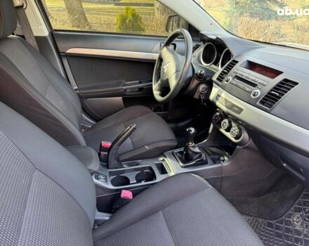 Бежевий Міцубісі Lancer, об'ємом двигуна 1.5 л та пробігом 217 тис. км за 5690 $, фото 18 на Automoto.ua