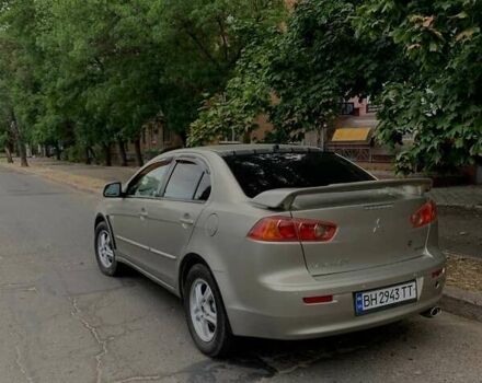 Бежевий Міцубісі Lancer, об'ємом двигуна 2 л та пробігом 212 тис. км за 6300 $, фото 4 на Automoto.ua