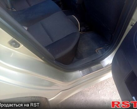 Бежевий Міцубісі Lancer, об'ємом двигуна 2 л та пробігом 209 тис. км за 7400 $, фото 2 на Automoto.ua