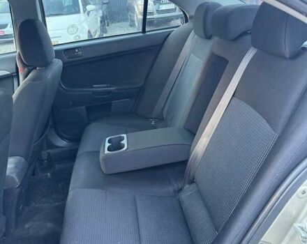 Бежевый Мицубиси Лансер, объемом двигателя 1.5 л и пробегом 187 тыс. км за 5500 $, фото 10 на Automoto.ua