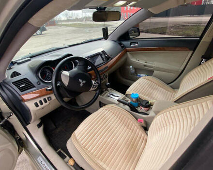 Бежевый Мицубиси Лансер, объемом двигателя 1.5 л и пробегом 200 тыс. км за 8500 $, фото 8 на Automoto.ua