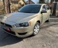 Бежевий Міцубісі Lancer, об'ємом двигуна 1.5 л та пробігом 217 тис. км за 5690 $, фото 1 на Automoto.ua